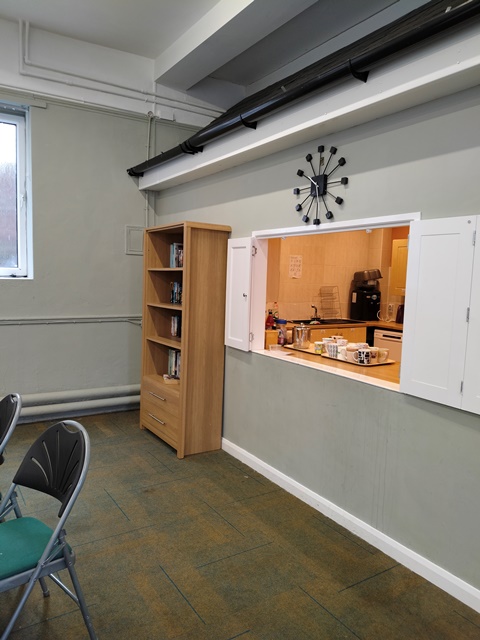 View of the hall from the kitchen hatch side of the room.