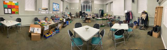 Tables set up with jumble items ready for the sale.